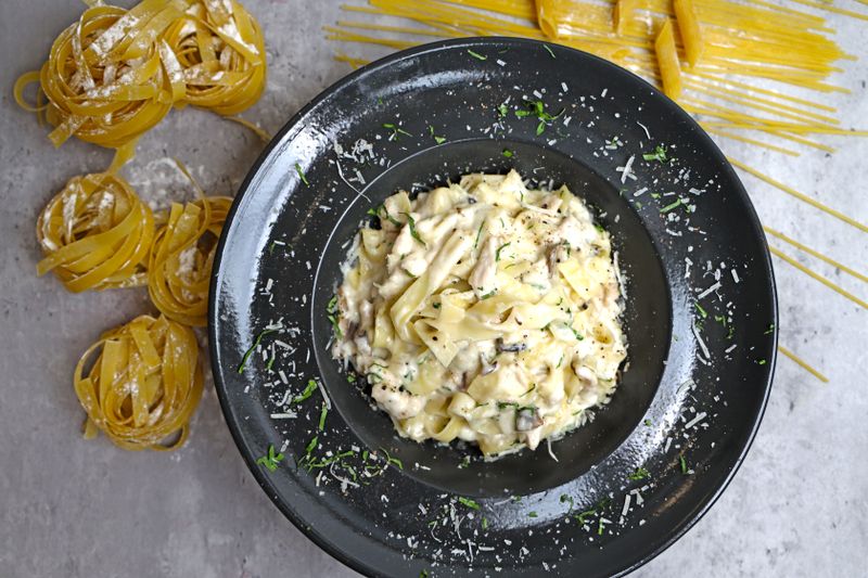 Fettuccine Alfredo pasta dish at Marcos